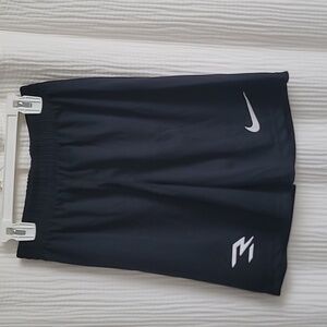 Youth, Nike shorts, size M.